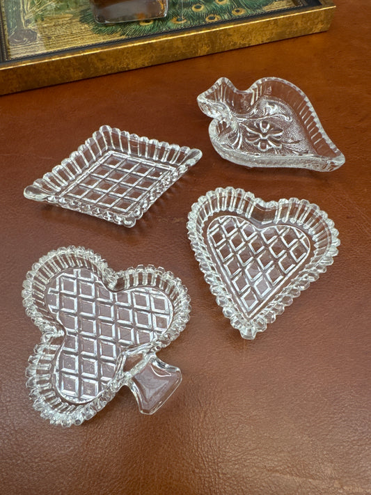 Set of four vintage pressed glass nut dishes