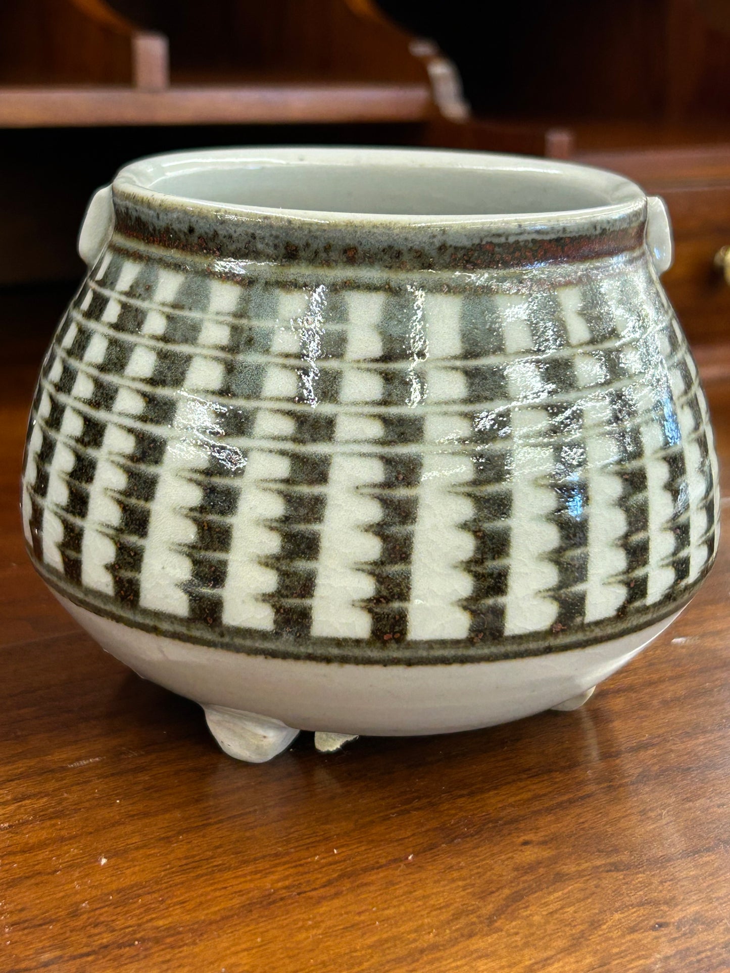 A striking signed Aguilar studio pottery piece